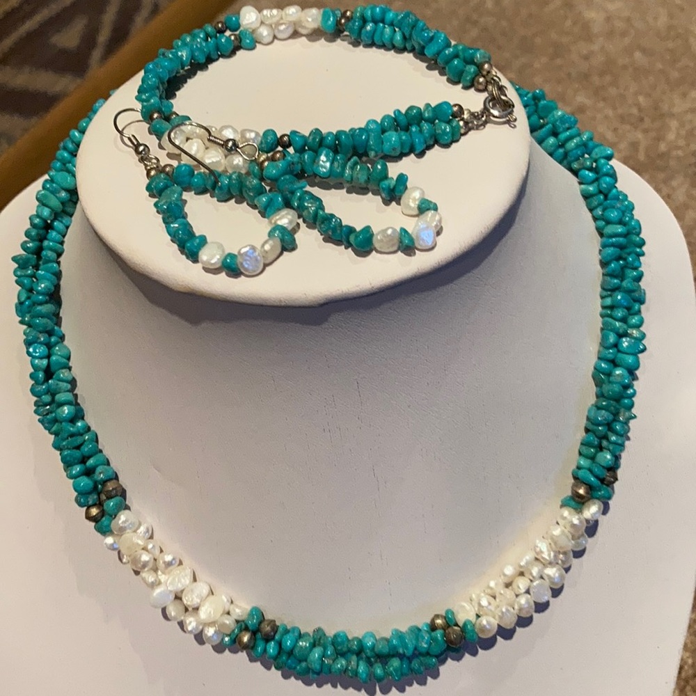 Necklace, bracelet, and dangling pierced earrings